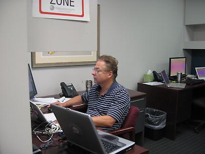 tom at his desk working.JPG - tom feltman image